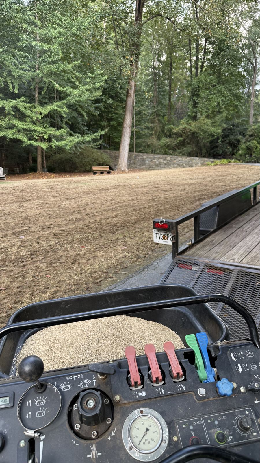 Core aerator on a dormant lawn